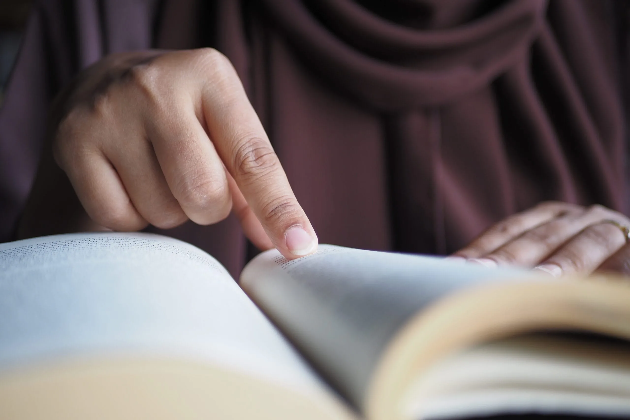 Home 5 close up of women hand turning a pager of a diary 2024 12 12 02 25 07 utc scaled