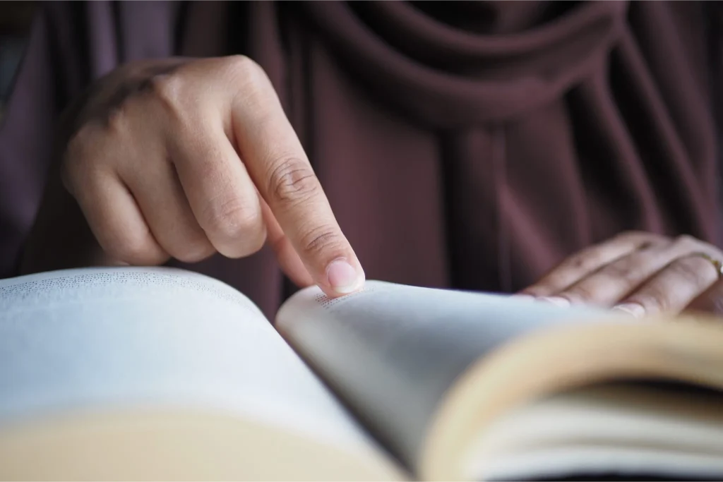 close up of women hand turning a pager of a diary 2024 12 12 02 25 07 utc 2048x1365.jpg 1